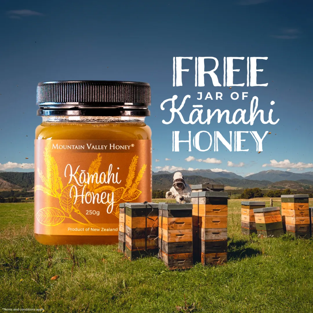 A Mountain Valley Honey social ad offering a free jar of Kāmahi Honey, with hives in a valley.