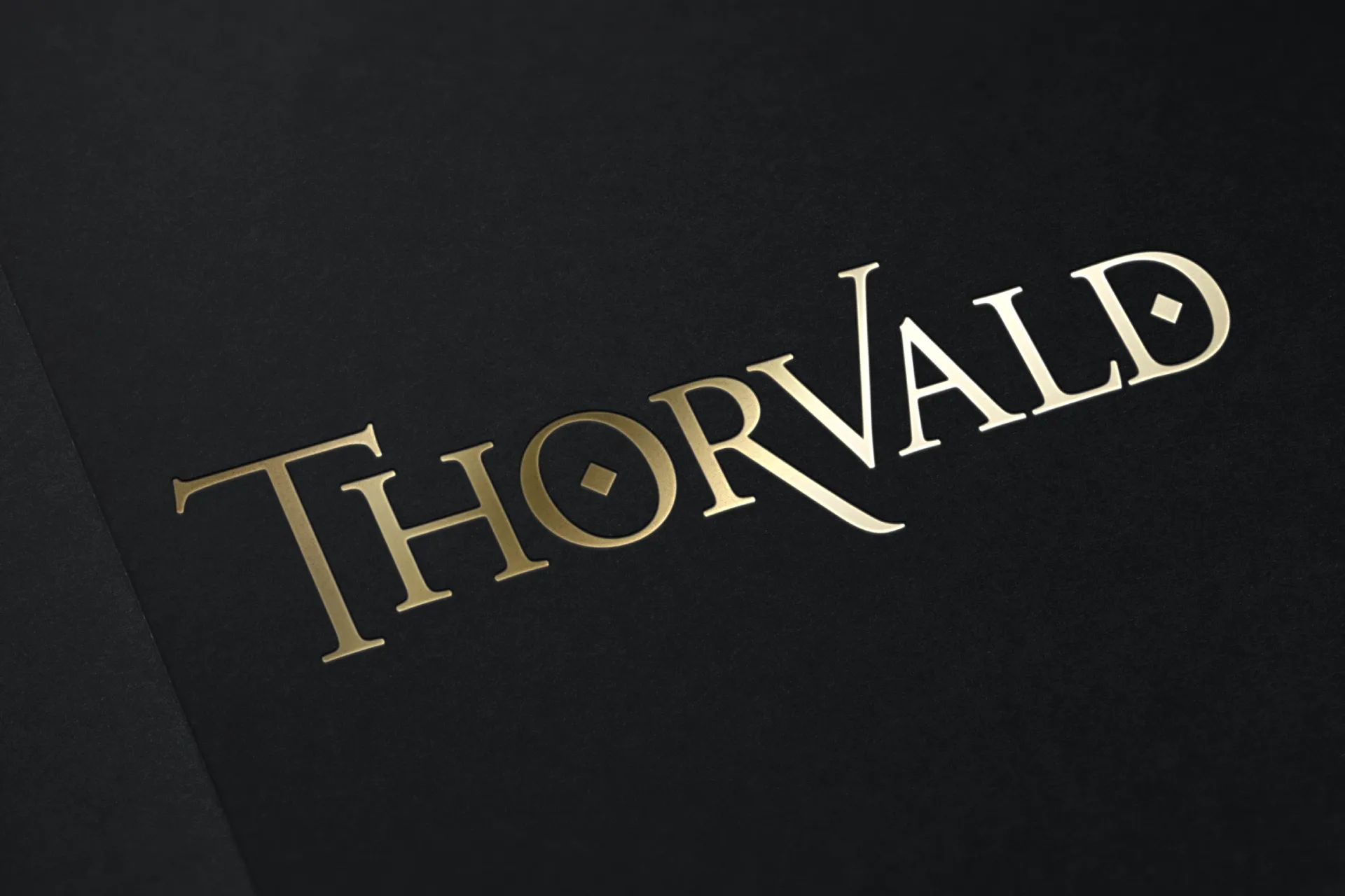 The Thorvald wordmark in gold on black.